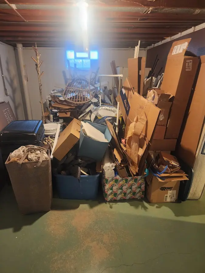 Roll-off dumpster container at job site for Construction Dumpster Rental in Huntington Woods